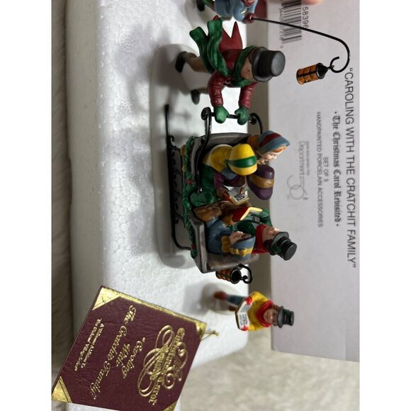 Department 56 Heritage Village Collection Caroling w/ the Cratchit family - Picture 4 of 7